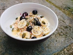 Mix fruit with yoghurt